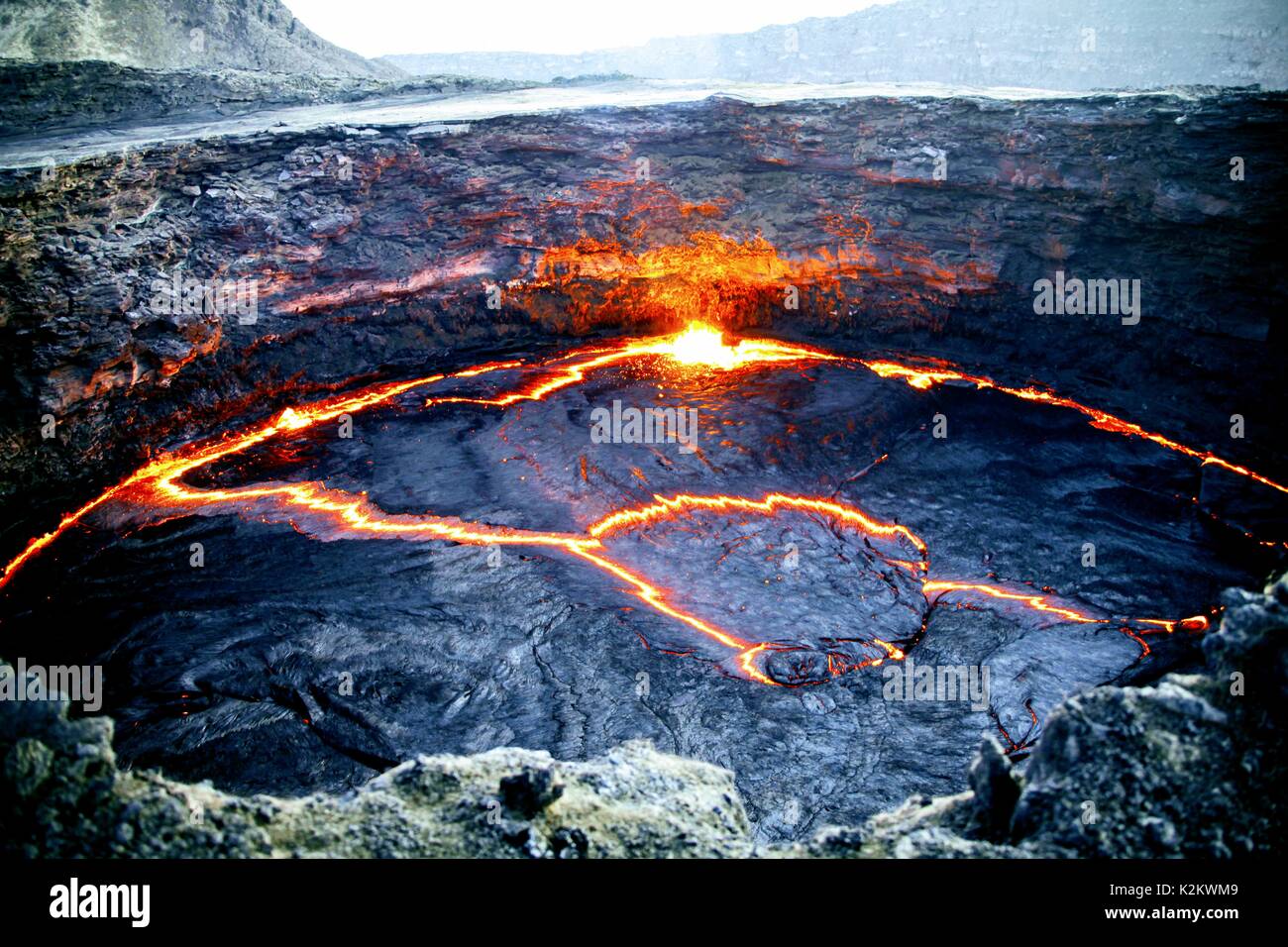 Wide view of the Erta Ale crater with molten lava channels.